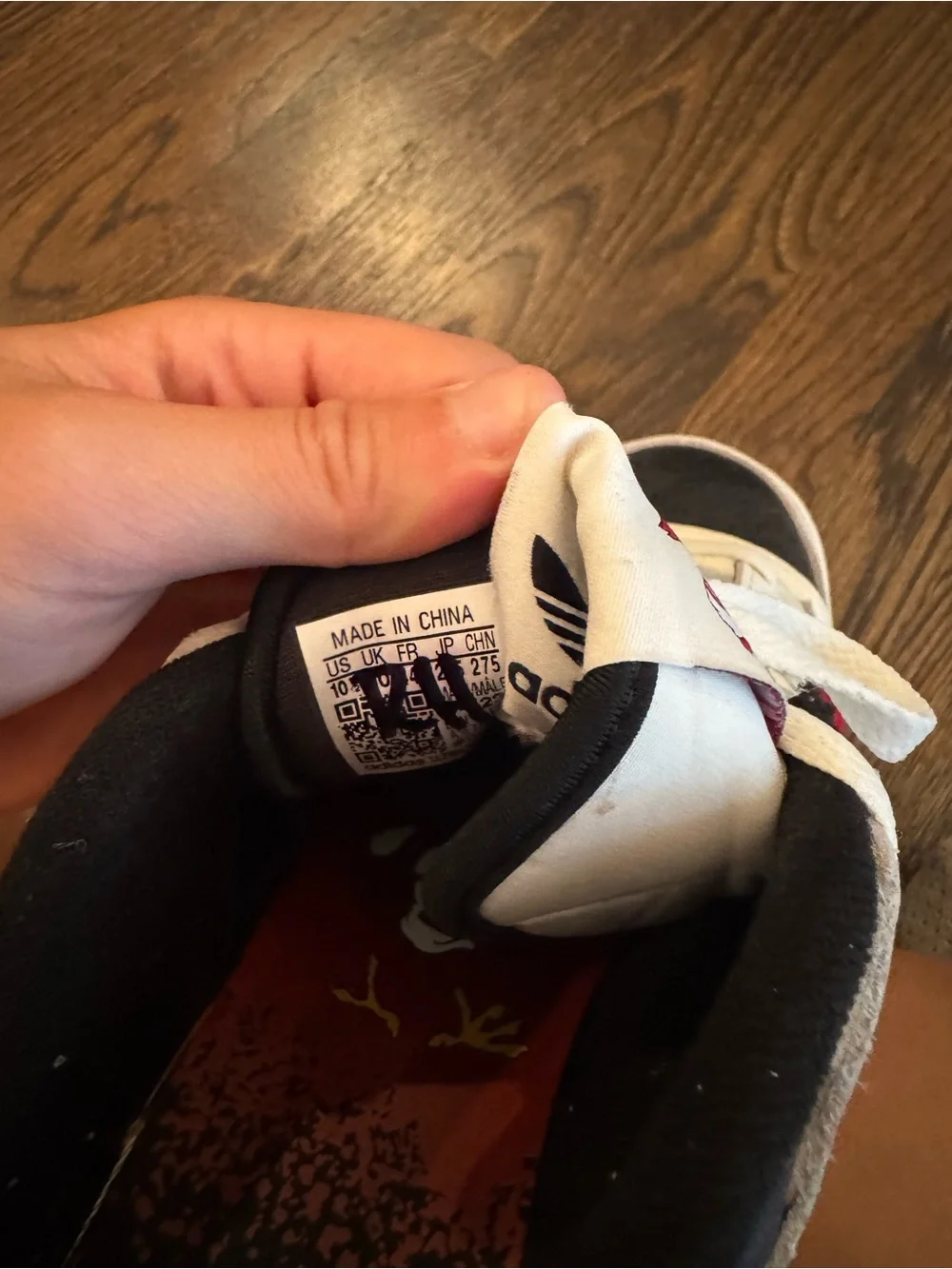 adidas White Sneakers with Black Toe and Red Stripes